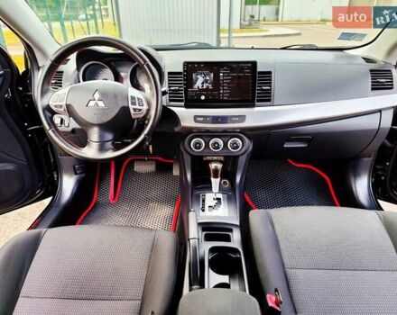 Чорний Міцубісі Lancer, об'ємом двигуна 2 л та пробігом 175 тис. км за 7800 $, фото 14 на Automoto.ua