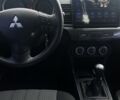 Чорний Міцубісі Lancer, об'ємом двигуна 2 л та пробігом 221 тис. км за 5500 $, фото 10 на Automoto.ua
