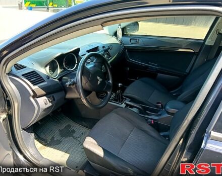 Мицубиси Лансер 2008 в Новомосковске на Automoto.ua Черный Мицубиси Лансер, объемом двигателя 1.5 л и пробегом 200 тыс. км за 6000 $, фото 4 на Automoto.ua