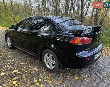 Чорний Міцубісі Lancer, об'ємом двигуна 2 л та пробігом 237 тис. км за 7500 $, фото 8 на Automoto.ua
