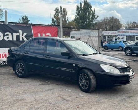 Мицубиси Лансер 2008 в Запорожье на Automoto.ua Черный Мицубиси Лансер, объемом двигателя 1.6 л и пробегом 316 тыс. км за 4290 $, фото 7 на Automoto.ua