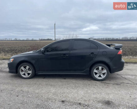 Чорний Міцубісі Lancer, об'ємом двигуна 2 л та пробігом 280 тис. км за 4400 $, фото 3 на Automoto.ua