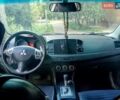 Черный Мицубиси Лансер, объемом двигателя 2 л и пробегом 180 тыс. км за 5800 $, фото 3 на Automoto.ua