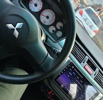Мицубиси Лансер 2008 в Львове на Automoto.ua Черный Мицубиси Лансер, объемом двигателя 1.58 л и пробегом 200 тыс. км за 5200 $, фото 104 на Automoto.ua