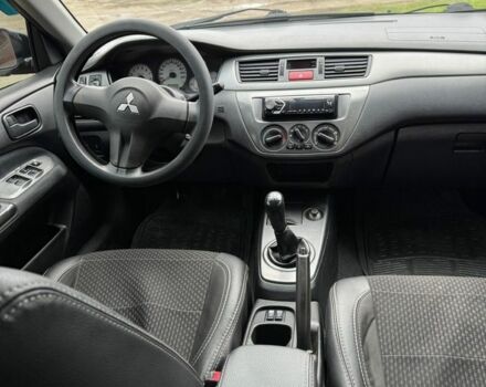 Чорний Міцубісі Lancer, об'ємом двигуна 1.6 л та пробігом 220 тис. км за 3600 $, фото 11 на Automoto.ua