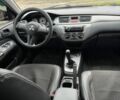 Чорний Міцубісі Lancer, об'ємом двигуна 1.6 л та пробігом 220 тис. км за 3600 $, фото 11 на Automoto.ua