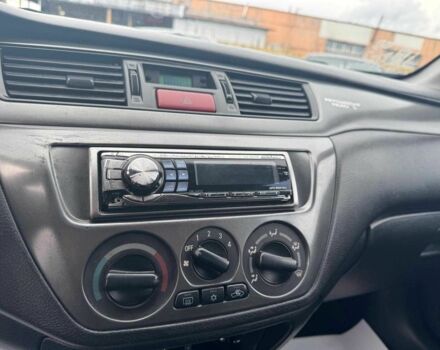 Мицубиси Лансер 2008 в Запорожье на Automoto.ua Черный Мицубиси Лансер, объемом двигателя 1.6 л и пробегом 316 тыс. км за 4290 $, фото 16 на Automoto.ua