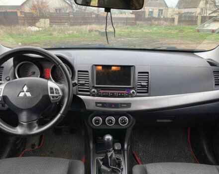 Чорний Міцубісі Lancer, об'ємом двигуна 2 л та пробігом 180 тис. км за 7500 $, фото 5 на Automoto.ua