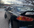 Чорний Міцубісі Lancer, об'ємом двигуна 2 л та пробігом 290 тис. км за 6500 $, фото 2 на Automoto.ua