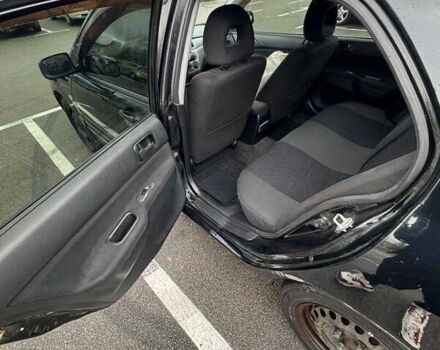 Чорний Міцубісі Lancer, об'ємом двигуна 1.6 л та пробігом 245 тис. км за 4500 $, фото 17 на Automoto.ua