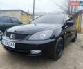 Черный Мицубиси Лансер, объемом двигателя 1.58 л и пробегом 243 тыс. км за 5600 $, фото 1 на Automoto.ua