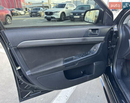 Чорний Міцубісі Lancer, об'ємом двигуна 2 л та пробігом 290 тис. км за 5900 $, фото 19 на Automoto.ua