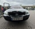 Чорний Міцубісі Lancer, об'ємом двигуна 1.58 л та пробігом 318 тис. км за 3600 $, фото 13 на Automoto.ua
