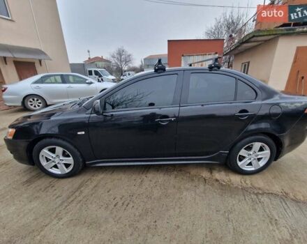 Чорний Міцубісі Lancer, об'ємом двигуна 2 л та пробігом 300 тис. км за 6000 $, фото 1 на Automoto.ua