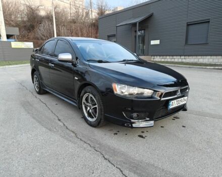 Черный Мицубиси Лансер, объемом двигателя 2 л и пробегом 245 тыс. км за 5600 $, фото 7 на Automoto.ua