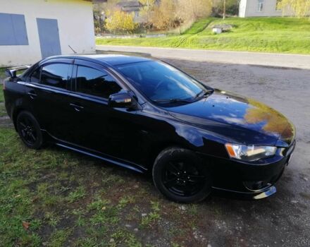 Міцубісі Lancer 2008 у Києві на Automoto.ua Чорний Міцубісі Lancer, об'ємом двигуна 2 л та пробігом 196 тис. км за 5500 $, фото 4 на Automoto.ua