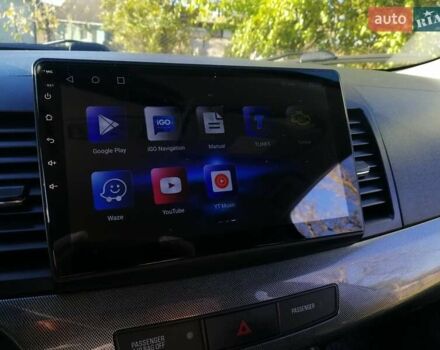 Мицубиси Лансер 2008 в Киеве на Automoto.ua Черный Мицубиси Лансер, объемом двигателя 2 л и пробегом 196 тыс. км за 5500 $, фото 14 на Automoto.ua