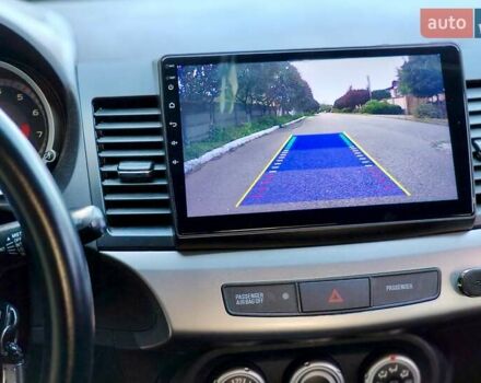 Черный Мицубиси Лансер, объемом двигателя 1.8 л и пробегом 172 тыс. км за 7100 $, фото 12 на Automoto.ua