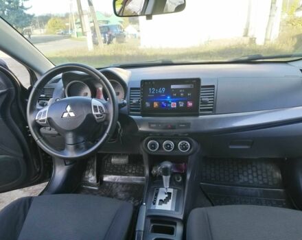 Міцубісі Lancer 2008 у Києві на Automoto.ua Чорний Міцубісі Lancer, об'ємом двигуна 2 л та пробігом 196 тис. км за 5500 $, фото 19 на Automoto.ua