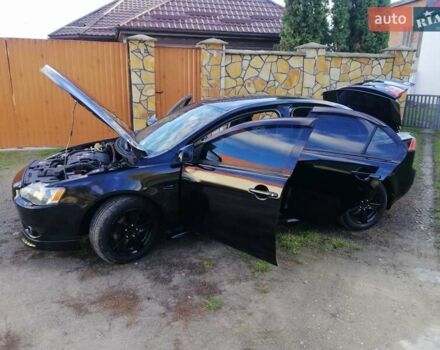 Мицубиси Лансер 2008 в Киеве на Automoto.ua Черный Мицубиси Лансер, объемом двигателя 2 л и пробегом 196 тыс. км за 5500 $, фото 32 на Automoto.ua