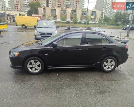 Черный Мицубиси Лансер, объемом двигателя 2 л и пробегом 229 тыс. км за 7300 $, фото 3 на Automoto.ua