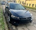 Черный Мицубиси Лансер, объемом двигателя 2 л и пробегом 20000 тыс. км за 5400 $, фото 1 на Automoto.ua