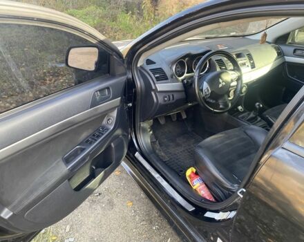 Черный Мицубиси Лансер, объемом двигателя 2 л и пробегом 190 тыс. км за 3100 $, фото 3 на Automoto.ua