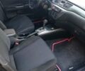 Чорний Міцубісі Lancer, об'ємом двигуна 1.58 л та пробігом 286 тис. км за 4950 $, фото 17 на Automoto.ua