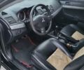 Черный Мицубиси Лансер, объемом двигателя 1.5 л и пробегом 171 тыс. км за 5150 $, фото 12 на Automoto.ua