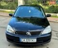 Черный Мицубиси Лансер, объемом двигателя 1.58 л и пробегом 280 тыс. км за 4350 $, фото 10 на Automoto.ua