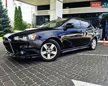 Чорний Міцубісі Lancer, об'ємом двигуна 2 л та пробігом 240 тис. км за 7850 $, фото 12 на Automoto.ua