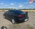 Черный Мицубиси Лансер, объемом двигателя 2 л и пробегом 342 тыс. км за 5800 $, фото 3 на Automoto.ua