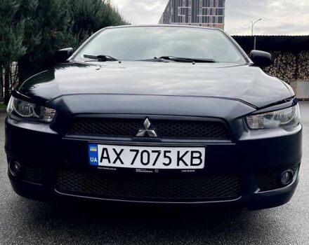 Чорний Міцубісі Lancer, об'ємом двигуна 2 л та пробігом 217 тис. км за 5600 $, фото 1 на Automoto.ua