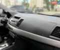 Чорний Міцубісі Lancer, об'ємом двигуна 2 л та пробігом 220 тис. км за 5850 $, фото 28 на Automoto.ua