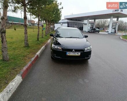 Черный Мицубиси Лансер, объемом двигателя 2 л и пробегом 200 тыс. км за 5100 $, фото 3 на Automoto.ua