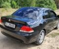 Черный Мицубиси Лансер, объемом двигателя 1.5 л и пробегом 310 тыс. км за 3804 $, фото 1 на Automoto.ua