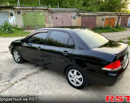 Чорний Міцубісі Lancer, об'ємом двигуна 1.6 л та пробігом 190 тис. км за 3950 $, фото 7 на Automoto.ua