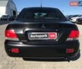 Мицубиси Лансер 2008 в Львове на Automoto.ua Черный Мицубиси Лансер, объемом двигателя 1.6 л и пробегом 356 тыс. км за 4590 $, фото 11 на Automoto.ua