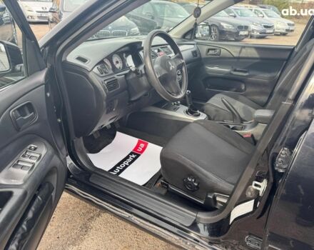 Мицубиси Лансер 2008 в Запорожье на Automoto.ua Черный Мицубиси Лансер, объемом двигателя 1.6 л и пробегом 316 тыс. км за 4290 $, фото 10 на Automoto.ua