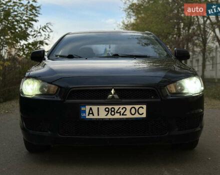 Черный Мицубиси Лансер, объемом двигателя 1.5 л и пробегом 285 тыс. км за 4800 $, фото 12 на Automoto.ua