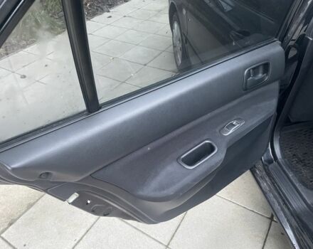 Черный Мицубиси Лансер, объемом двигателя 1.6 л и пробегом 226 тыс. км за 3750 $, фото 12 на Automoto.ua