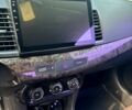 Черный Мицубиси Лансер, объемом двигателя 1.5 л и пробегом 210 тыс. км за 5000 $, фото 6 на Automoto.ua