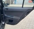 Чорний Міцубісі Lancer, об'ємом двигуна 1.8 л та пробігом 177 тис. км за 6999 $, фото 47 на Automoto.ua