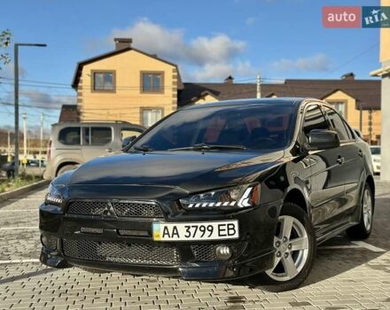 Чорний Міцубісі Lancer, об'ємом двигуна 2 л та пробігом 150 тис. км за 7999 $, фото 2 на Automoto.ua