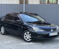 Міцубісі Lancer 2008 у Синельниковом на Automoto.ua Чорний Міцубісі Lancer, об'ємом двигуна 1.6 л та пробігом 230 тис. км за 4500 $, фото 1 на Automoto.ua