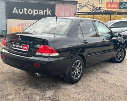 Мицубиси Лансер 2008 в Запорожье на Automoto.ua Черный Мицубиси Лансер, объемом двигателя 1.6 л и пробегом 316 тыс. км за 4290 $, фото 4 на Automoto.ua