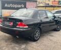 Мицубиси Лансер 2008 в Запорожье на Automoto.ua Черный Мицубиси Лансер, объемом двигателя 1.6 л и пробегом 316 тыс. км за 4290 $, фото 4 на Automoto.ua