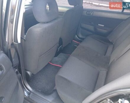 Чорний Міцубісі Lancer, об'ємом двигуна 1.58 л та пробігом 286 тис. км за 4950 $, фото 10 на Automoto.ua