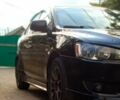 Чорний Міцубісі Lancer, об'ємом двигуна 2 л та пробігом 213 тис. км за 6200 $, фото 1 на Automoto.ua
