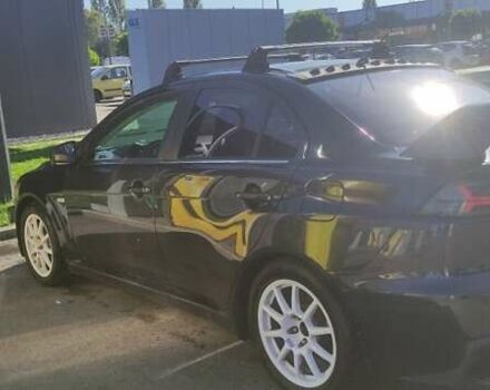 Чорний Міцубісі Lancer, об'ємом двигуна 2 л та пробігом 134 тис. км за 29034 $, фото 9 на Automoto.ua